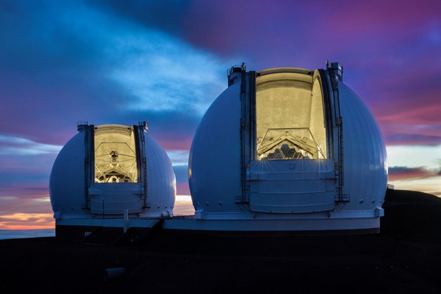 The twin telescopes of the Keck Observatory sit atop Mauna Kea in Hawaii. Ethan Tweedie Photography